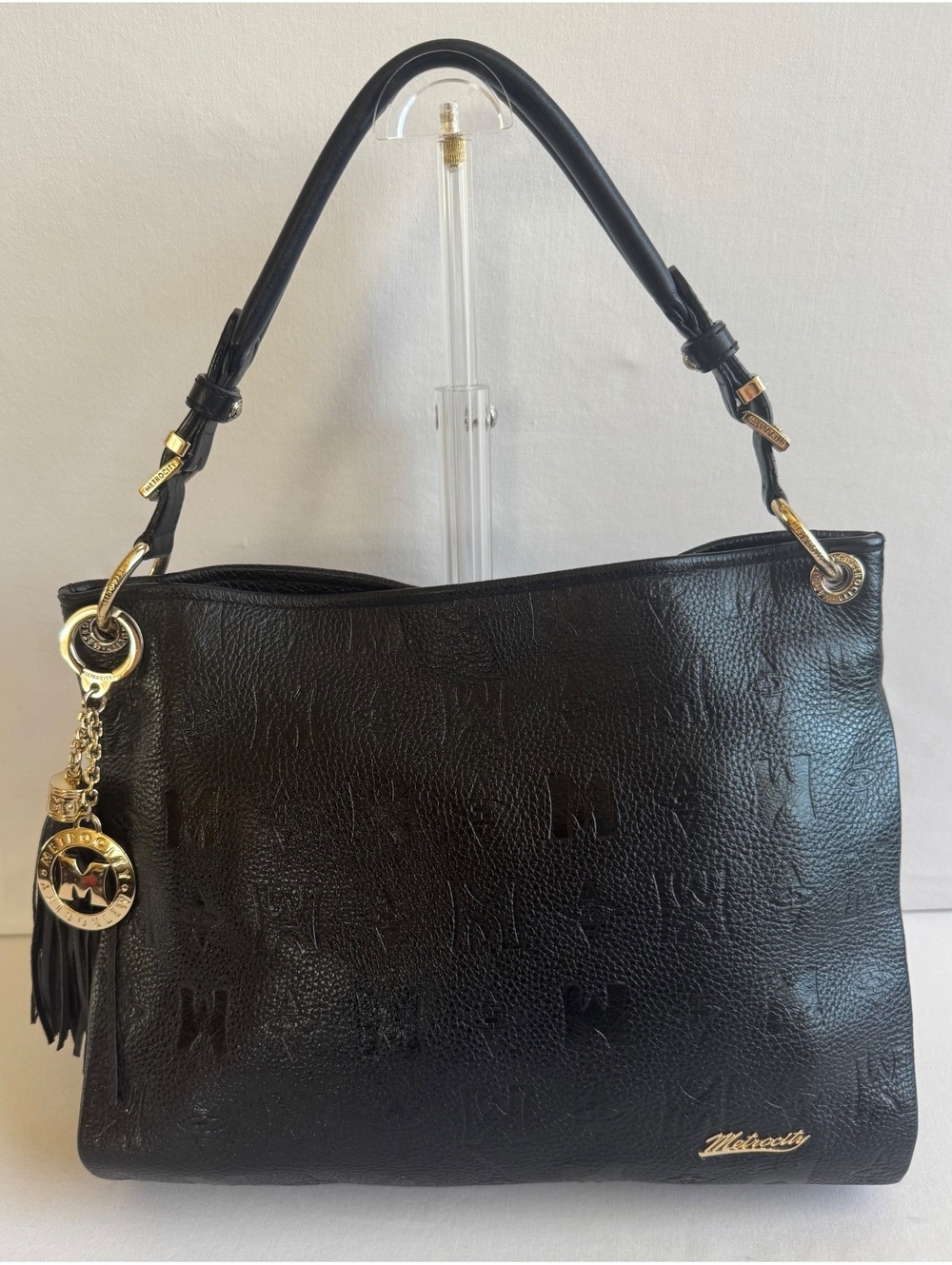 Metrocity Black Leather Embossed Monogram Shoulder Hobo Bag Gold Hardware Tassel